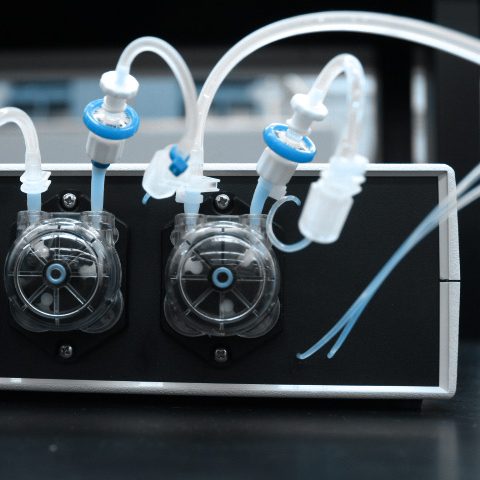 Pump system for automated sample testing